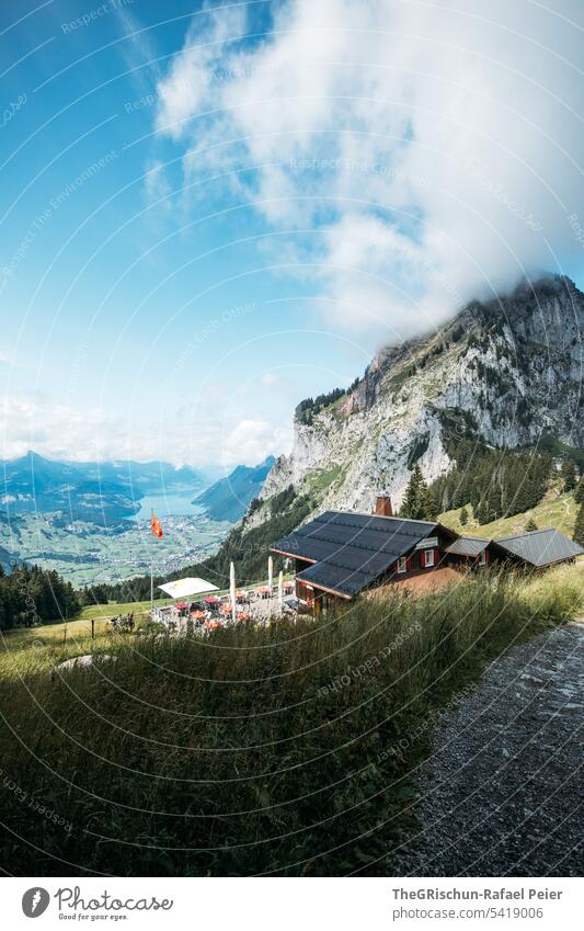 Restaurant with Grosser Mythen in the background Hiking Vantage point Mountain Switzerland big myths Nature Landscape Alps Exterior shot Colour photo Tourism