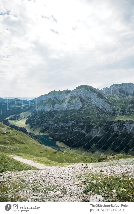 Mountain with lake in foreground Vantage point Panorama (View) Sky Clouds Alpstein hiking country appenzellerland Appenzell mountain stones Rock Walking Hiking