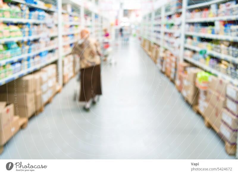 Market shop and supermarket interior blur background store grocery people customer shelf retail buy mall aisle perspective consumer food sale business light row