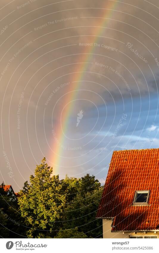 The rainbow opposite Rainbow House (Residential Structure) house corner Exterior shot Town Deserted Colour photo sunshine Rain and sunshine Sky Day Sunlight