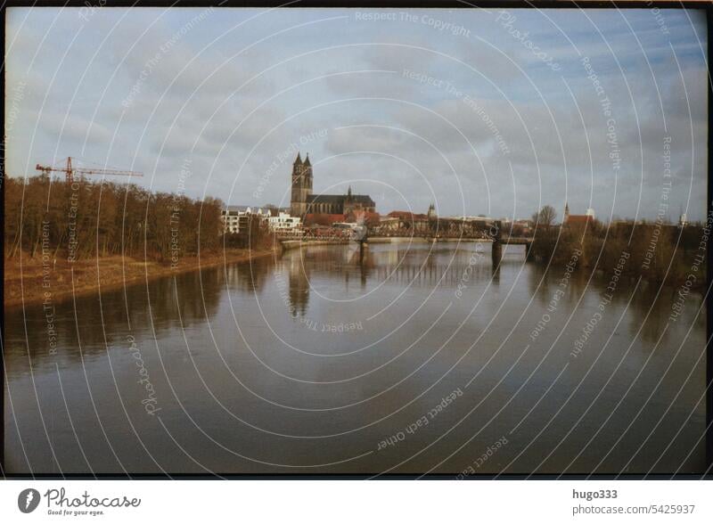 View of Magdeburg Magdeburg Cathedral star bridge Elbe Panorama (View) Construction crane Dome Town urban Bridge Wide Clouds Exterior shot Colour photo Landmark