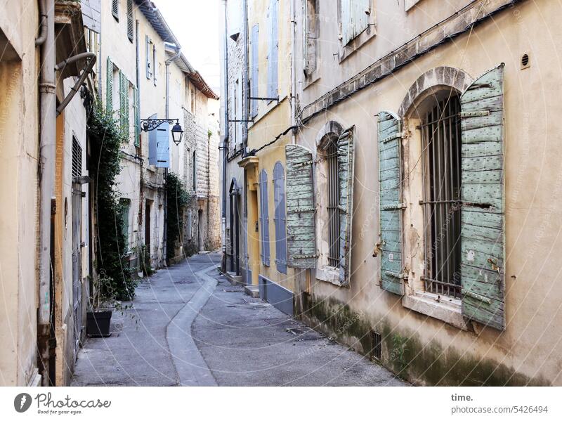 old town alley Old town Alley houses dwell Architecture urban Window shutters window grilles Historic attitude to life Narrow Stone Facade allure style