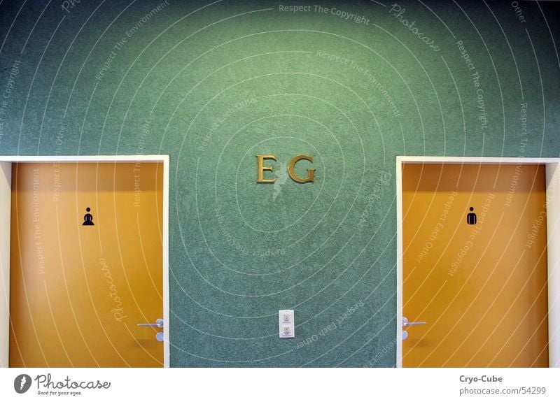 orange doors Yellow Multicoloured Wall (building) Green Frontal Loneliness Interior shot Artificial light Seventies Door Symetric symmetry Orange Toilet Room