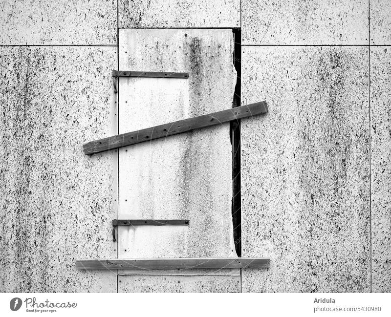 Boarded up door of abandoned dilapidated building House (Residential Structure) locked nailed wooden slats too Wall (building) Facade Building Entrance