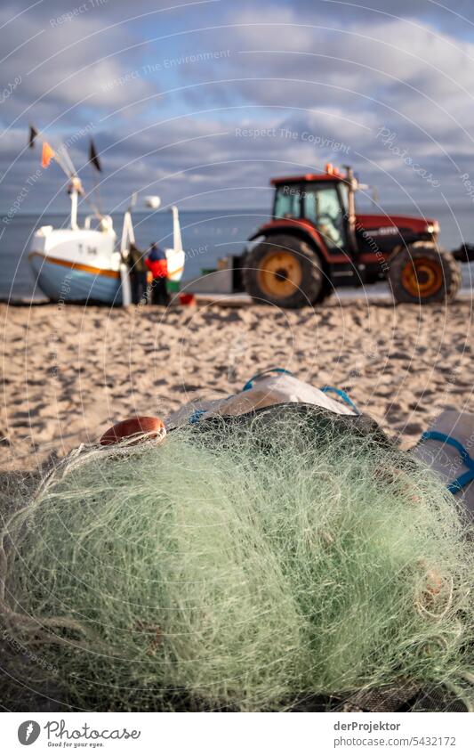 Fishing boat with tractor and net on Vorupør beach in Denmark in sunrise Sand Colour photo Relaxation Beach life Vacation & Travel bathe Recreation area