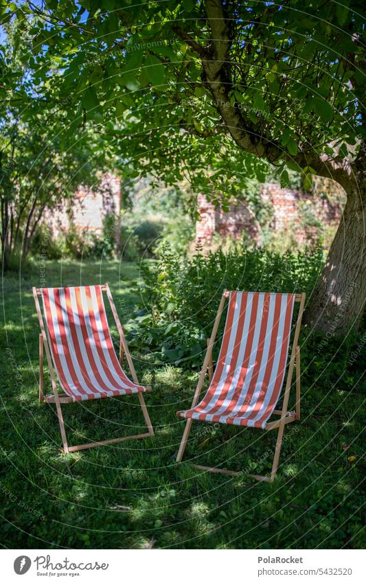 #A0# Deck chairs allotment Garden local recreation Lie relax local recreation area Tourist To enjoy Sunbathing Sunlight Deckchair Well-being Tourism Striped