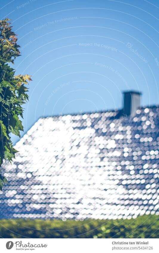 Glittering house roof in the sunlight, there would be plenty of room for a photovoltaic system here Roofing tile reflect Sunlight Dazzle Reflection sparkle