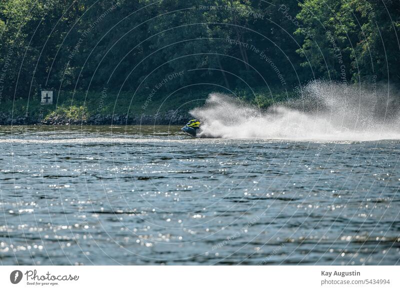 Jet ski water fountain on the Rhine River jetski Watercraft Water fountain Rhine landscape Summer 2023 leisure fun free time Nature Jet-ski inland waterway