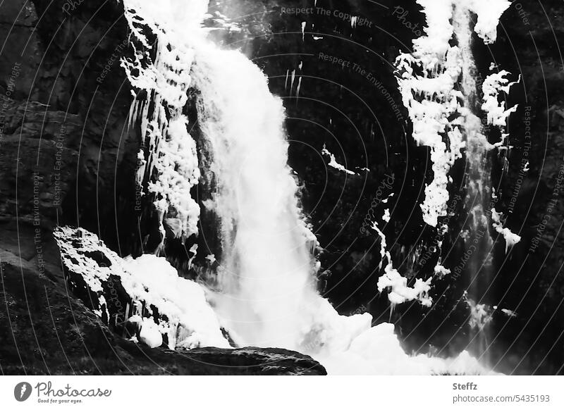 Waterfall with ice forms in Iceland Ice molds chill Frozen Freezing Icelandic Abstract iceland trip Snow iced water noise East Iceland hydropower Frost