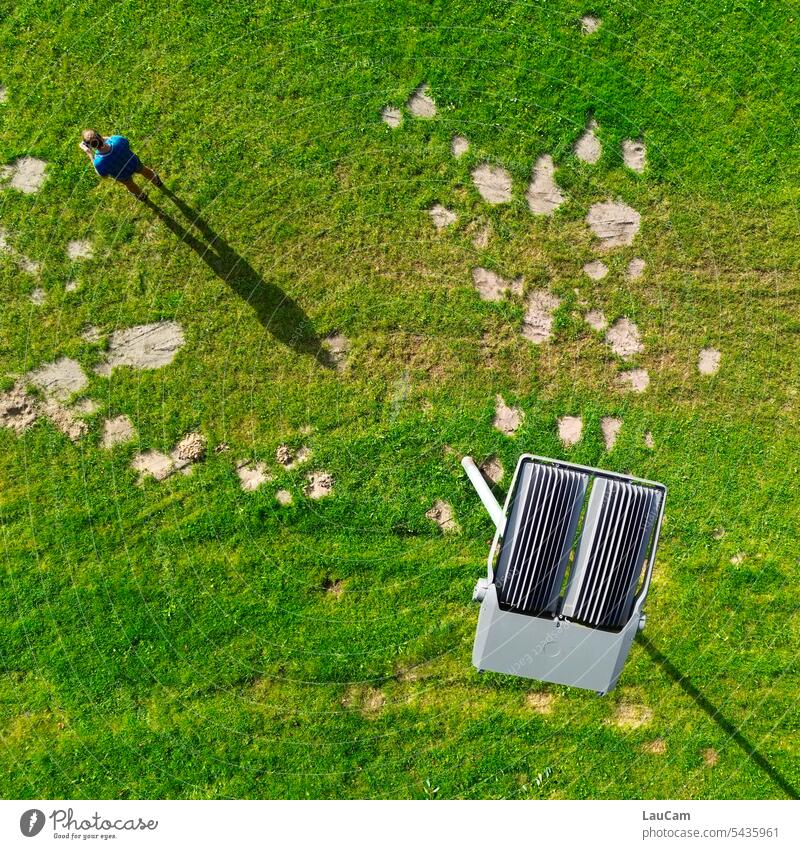 From the perspective of a lantern Lantern Bird's-eye view Shadow Meadow from on high Tall above look over Overview Observe observation Man Man from above Grass