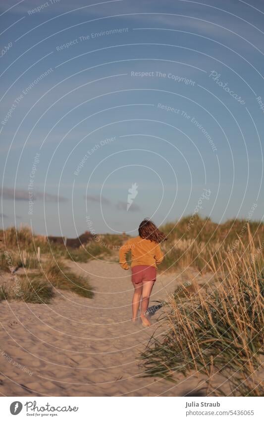 Girl running on a dune path Child Walking Sand duene Marram grass wonderful warm Summer Summer vacation Summertime Ocean Playing Catch Vacation & Travel