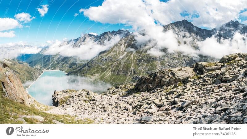 Mountain lake with clouds and mountains in background Clouds Sky Clouds in the sky Exterior shot Landscape Deserted Colour photo Nature Alps Day Blue Gray