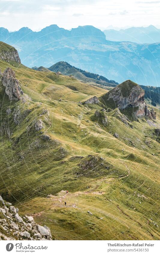 Mountain panorama with hiking trails hike Switzerland Sun Clouds Blue sky Alps mountain panorama mountains Clouds in the sky Panorama (View) Sky Nature