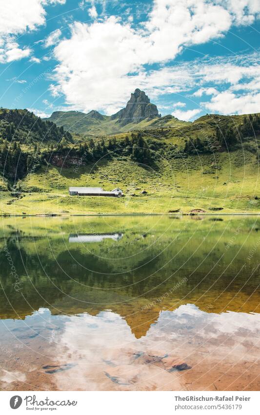 Mountain reflected in the mountain lake hike Switzerland Clouds Alps mountain panorama mountains Clouds in the sky Panorama (View) Sky Nature Landscape