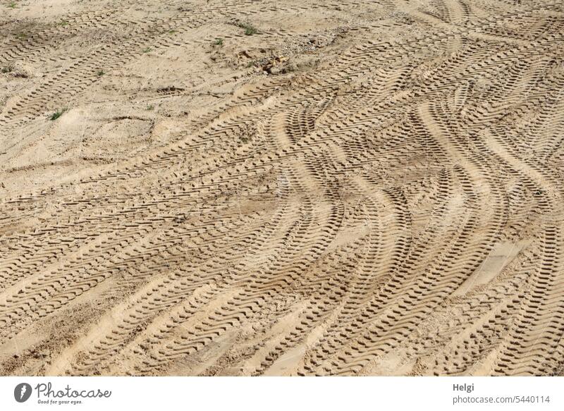 worn | many ruts in the sand Sand Sandbox Tracks Skid marks Many Imprint Exterior shot Tire tread Deserted Pattern Structures and shapes Subdued colour Beige