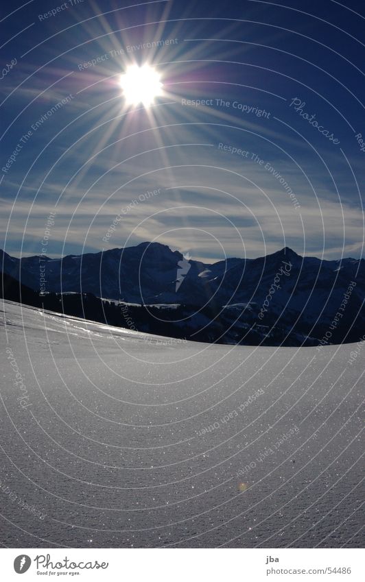 morning sun Sunrise White Clouds Vapor trail Saanenland Gstaad Saane district Powder snow Mountain Sky Lamp Blue Contrast Snow Glittering Vantage point eggli