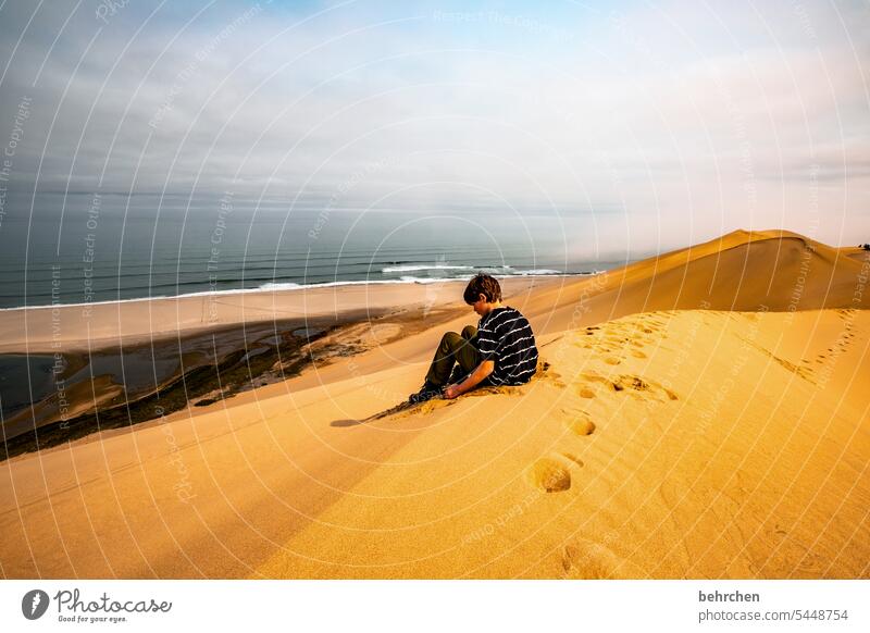 absorbed Dream Marvel outlook Vantage point Infancy Son Boy (child) Namibia Africa Desert Sand Ocean ocean wide Far-off places Wanderlust Longing travel