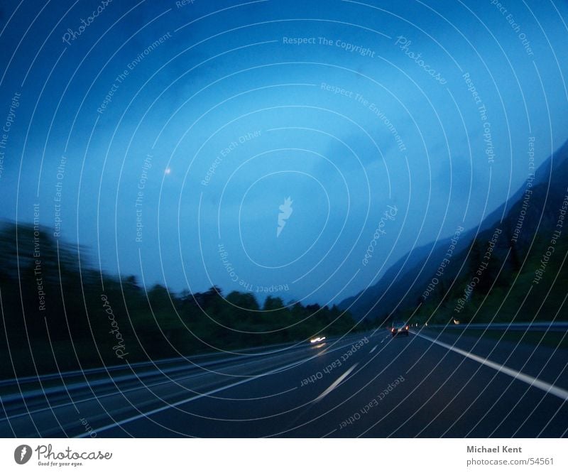 Motorway evening atmosphere Highway Driving Speed Twilight Switzerland Clouds Oncoming traffic Blue Dusk Evening Street Rain motion. track tempo.