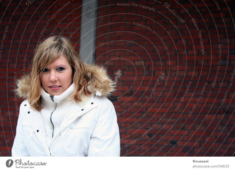 Early in the morning, it was cold .... Sweet Beautiful Youth (Young adults) Woman Wall (barrier) Red Stone Jacket White Portrait photograph Human being sandra