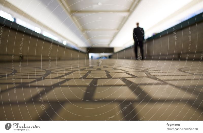 Clean substrate Pedestrian Loneliness Worm's-eye view Underpass Floor covering Lanes & trails Human being