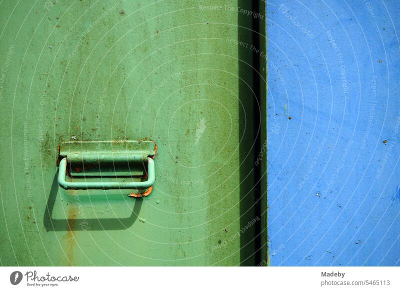 Old distribution box in green and blue at marina on Moselle river in Traben-Trarbach in Rhineland-Palatinate in Germany Harbour River Inner harbour