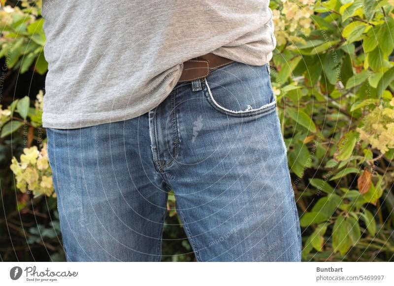 gray shirt over blue jeans with brown belt Pants Belt Jeans Fashion Denim Easygoing Cotton plant Clothing Blue Gray Close-up Style Design Detail textile