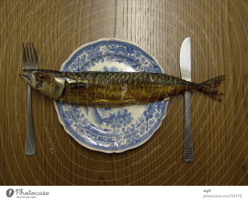 Meal fish. Mackerel Herring Smoked Plate Cutlery Table Friday Fresh Fish bone Delicious Macabre Nutrition Water wings Kipper