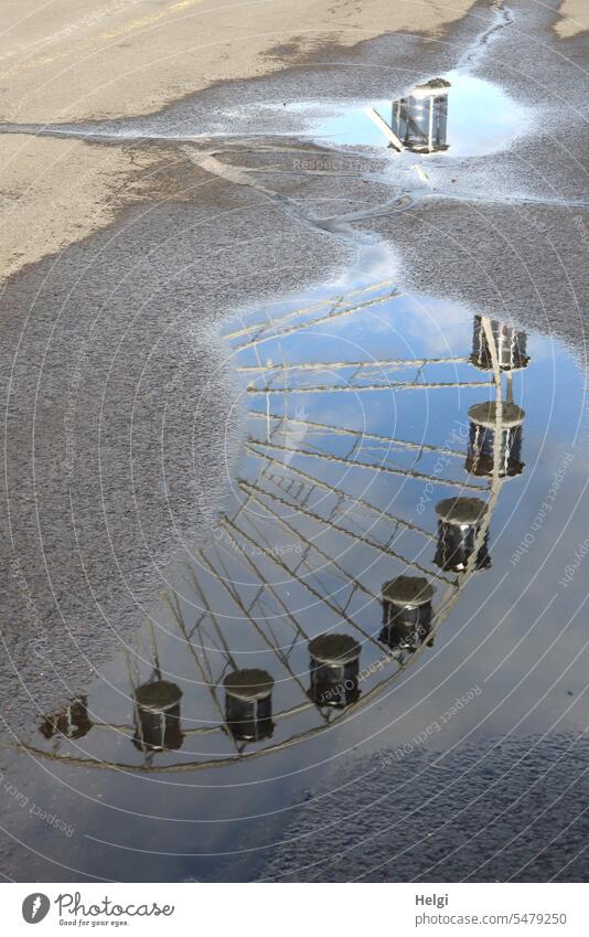 Ferris wheel reflected in a puddle Puddle reflection gondola Asphalt Light Shadow Sunlight Reflection Exterior shot Wet Water Colour photo Damp Rainy weather