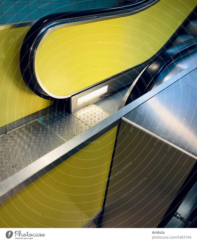 Yellow escalator Escalator Underground Stairs Upward Tile Blue Metal reflection Reflection rail Light Interior shot High-grade steel Train station Town