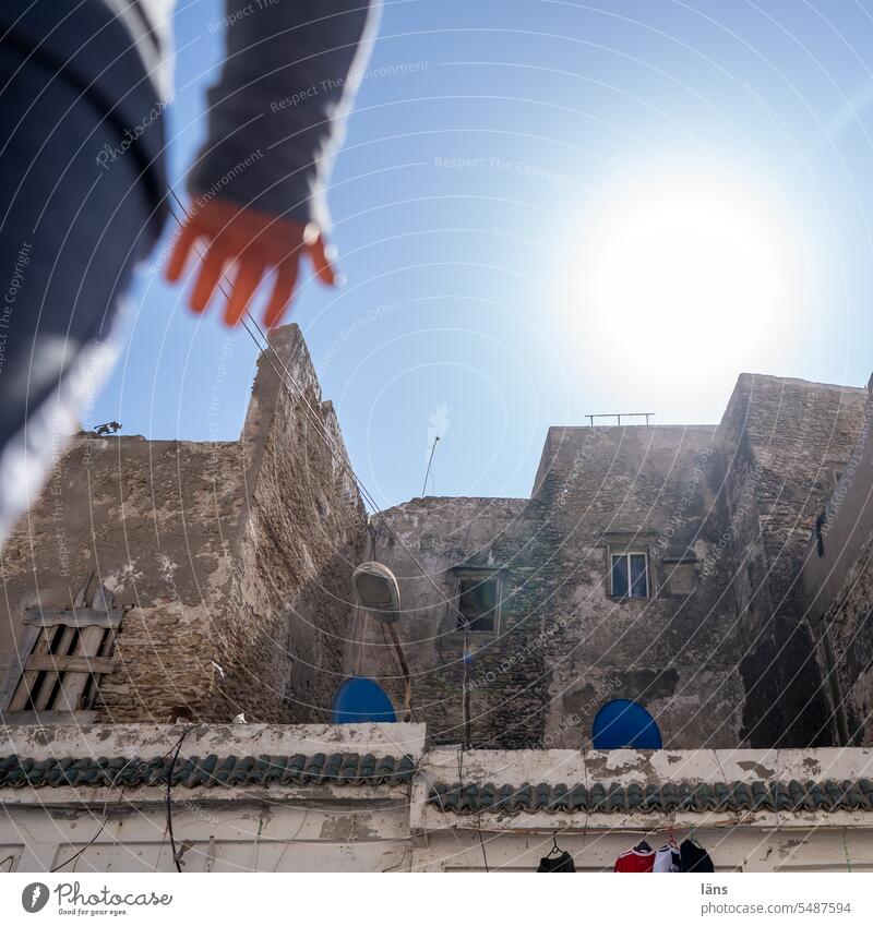 Doll in Morocco Essaouira Town doll's hand Vacation & Travel Exterior shot Africa Building Dolls sale Copy Space top Wall (barrier) Deserted Wall (building)