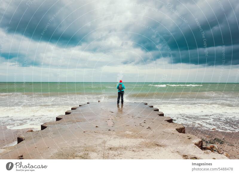 Look into the distance. Surf with waves. Baltic coast and stormy weather Far-off places look Waves Weather Tourist Woman Outdoors Nature more adult Adventure