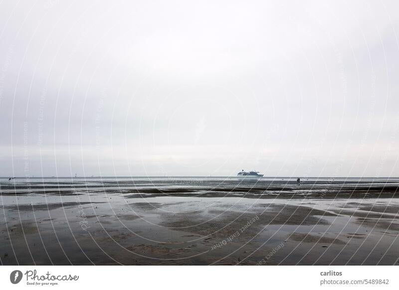 Low tide at Cuxhaven | Ship (almost) on dry land North Sea ship Horizon Clouds Beach Water Ocean coast Mud flats Tide Sand Vacation & Travel Relaxation Nature