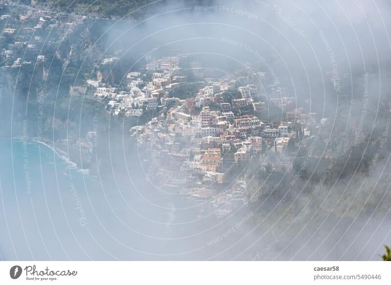 Beautiful clouds over Positano at teh Amalfi Coast, Italy italy positano sea travel amalfi coast mountain view sky campania water beach architecture