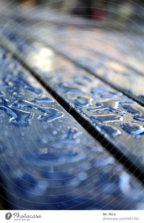 a drop seldom comes alone Table Wet raindrops Rainwater Damp Wooden table Bad weather Drops of water Surface downpour Blue Water Structures and shapes