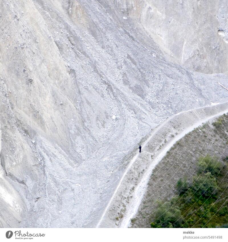 Caution landslide Mountain slope Gravel peril Slope stones Rock Alps Landscape Hiking Steep Vantage point hike hiking trail kerg Lunar landscape Rockfall person