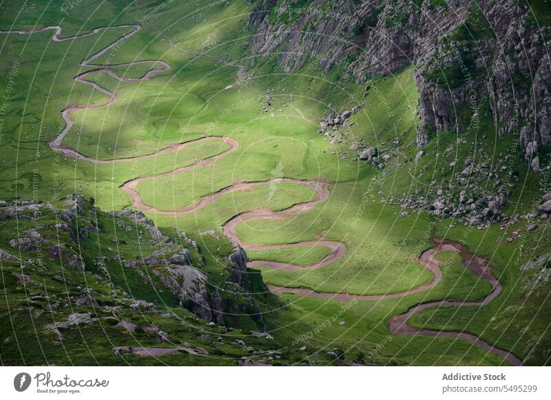 Amazing landscape of mountain ridge with valley rocky road nature highland picturesque pyrenees sunlight travel narrow roadway range hill path tourism spain