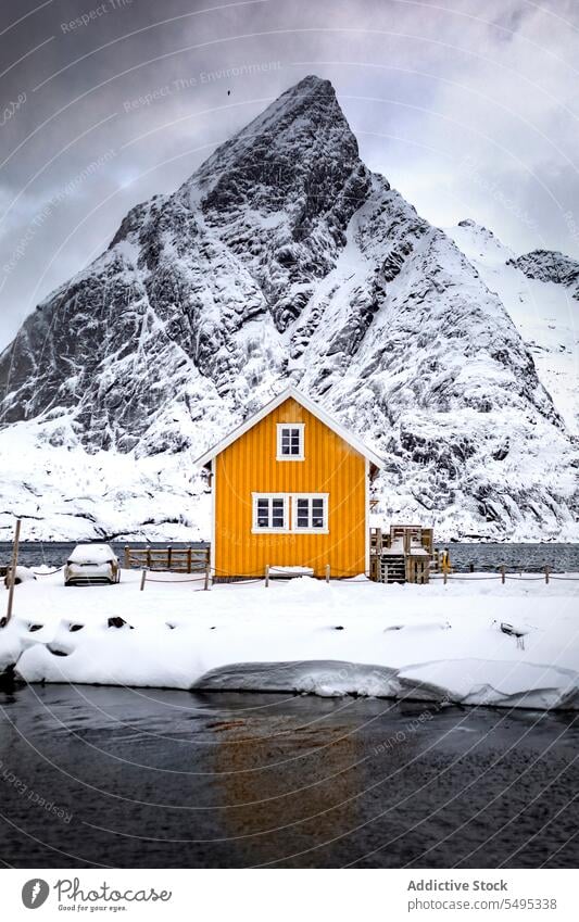 Exterior design of cabin in winter house northern light aurora borealis snow mountain exterior spectacular norway lapland lofoten island europe atlantic nordic