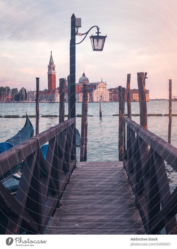 Wooden pier against Church of Most Holy Redeemer church of most holy redeemer chiesa del santissimo redentore ancient building wooden sunset magnificent