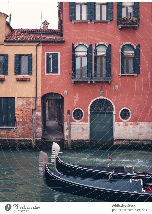 Exterior of old colorful buildings city street gondola house exterior facade canal boat venice italy europe tourism travel trip vacation weekend sightseeing