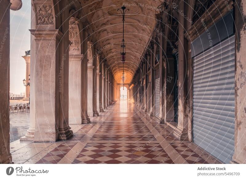 Arched passage of Biblioteca Marciana on Piazza San Marco library of saint mark biblioteca marciana piazza san marco saint marks square arch column old building