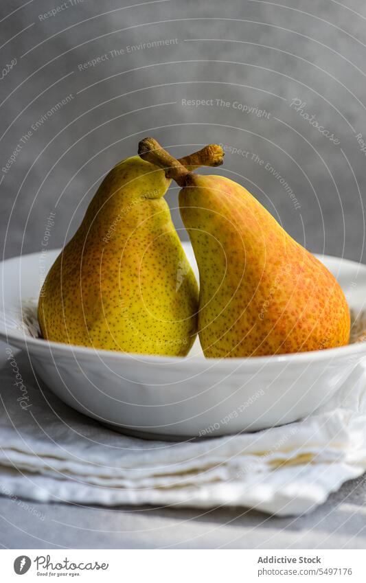 Marble plate with ripe pears bowl rustic table concret cotton eco friendly food organic fresh healthy fruit white natural juicy grocery vegetarian vitamin diet