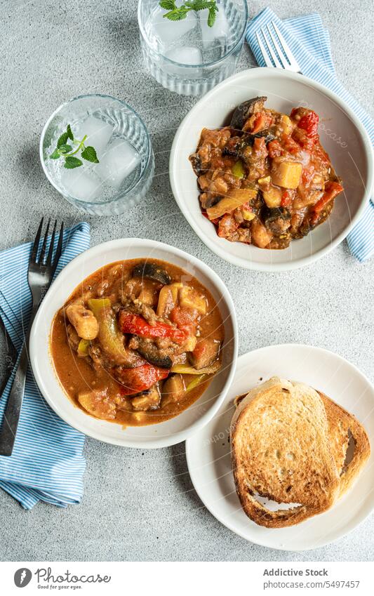 Traditional seasonal Georgian dish - Adjapsandali, is stewed vegetables like potato, bell peppers, tomato, egg plant, coriander and Georgian spices. plate menu