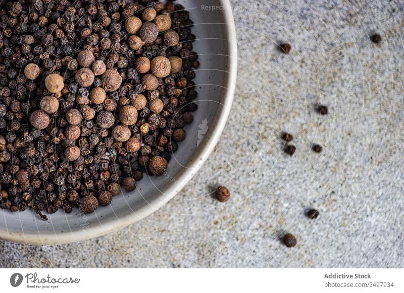 Bowl filled with natural aromatic Black pepper bowl black spice grain dried seasoning food vegetable ingredient organic fresh healthy tasty meal colorful cook