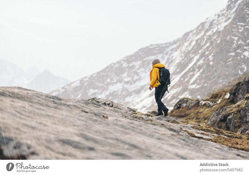 Woman on rocky terrain woman traveler cliff nature wanderlust female trip explore journey adventure backpack tourism formation rough hike environment activity