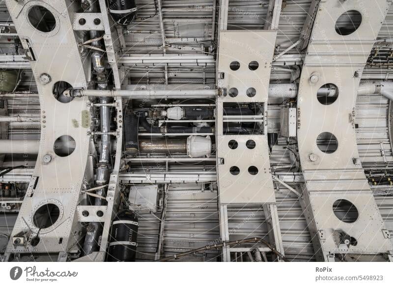 Supply lines in a historic military aircraft. Hydraulics Pump High pressure pump Engines Clutch Adapter Tractor Agriculture technique Machinery machine country