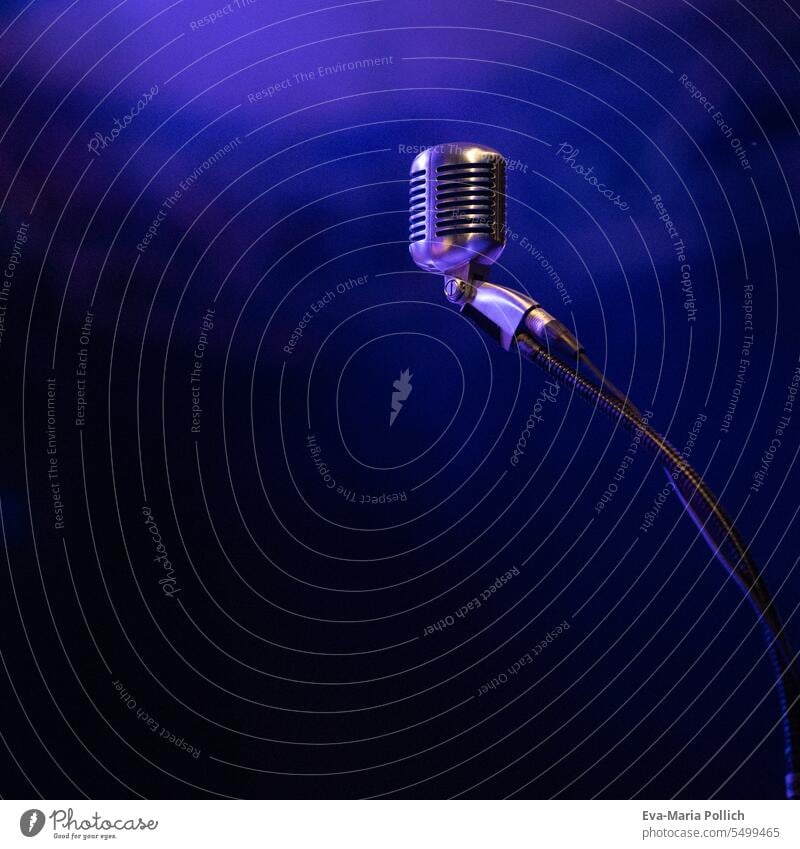 Retro style microphone in blue stage light Microphone Music Musician Make music Culture Leisure and hobbies Concert Detail Colour photo concerts concert stage