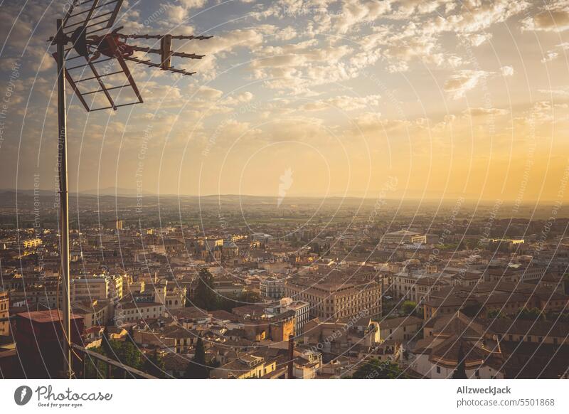 TV antenna and panoramic view over the historic city center of Granada in Andalusia at sunset Spain Andalucia Old town Panorama (View) Sunset Antenna