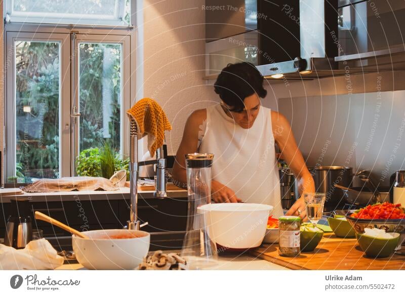 Drinkje bej Inkje | The hostess in her element - woman standing in the kitchen cutting vegetables Woman Kitchen Vegetable boil prepare Host Food Nutrition