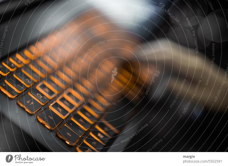 Hand writes on keyboard Keyboard Orange blurred Computer Technology Work and employment Business Workplace Notebook Internet laptop Typing Digital home office