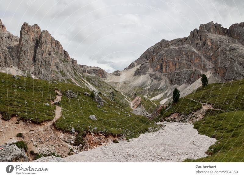 Mountain panorama, dry stream bed, hiking trail, rocks, saddle and boulder field, sky with clouds mountain Alps Peak Clouds Green Landscape South Tyrol Hiking